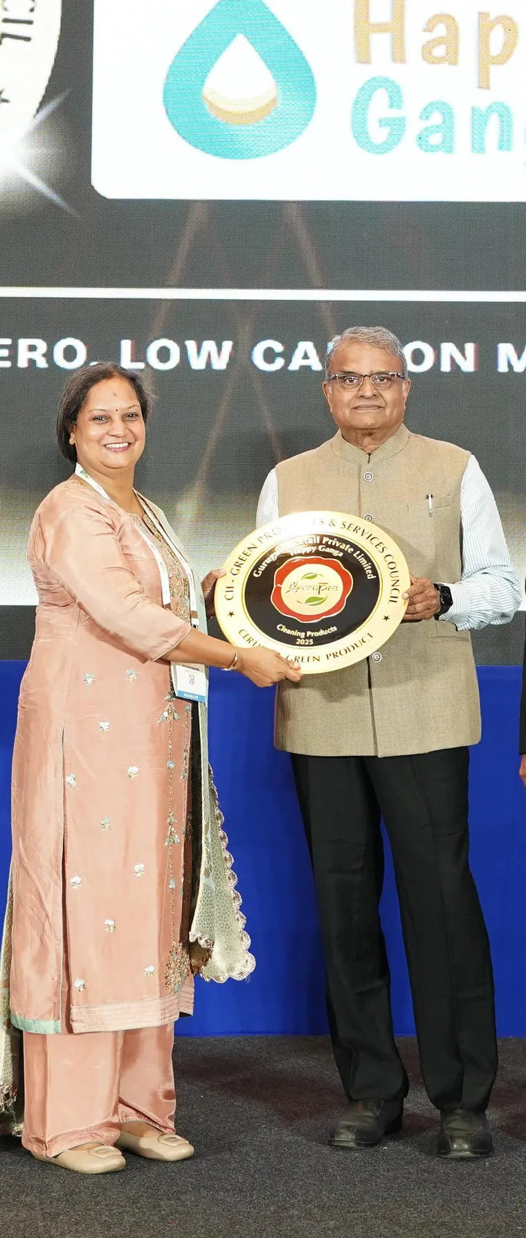 Priya receiving the CII GreenPro certificate for Happy Ganga